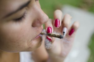 woman smoking a cannabis joint 2021 12 30 18 31 29 utc