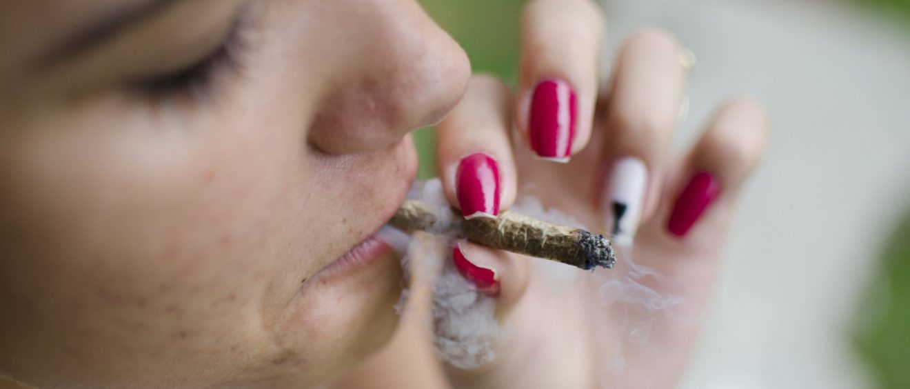 woman smoking a cannabis joint 2021 12 30 18 31 29 utc